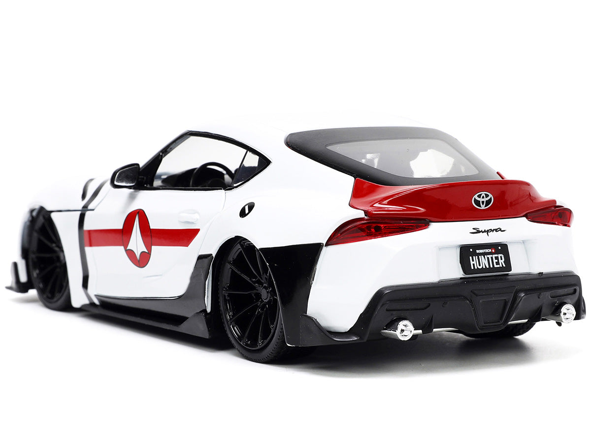 2020 Toyota Supra White and Rick Hunter Diecast Figurine "Robotech" "Hollywood Rides" Series 1/24 Diecast Model Car by Jada-DiecastModeler.com
