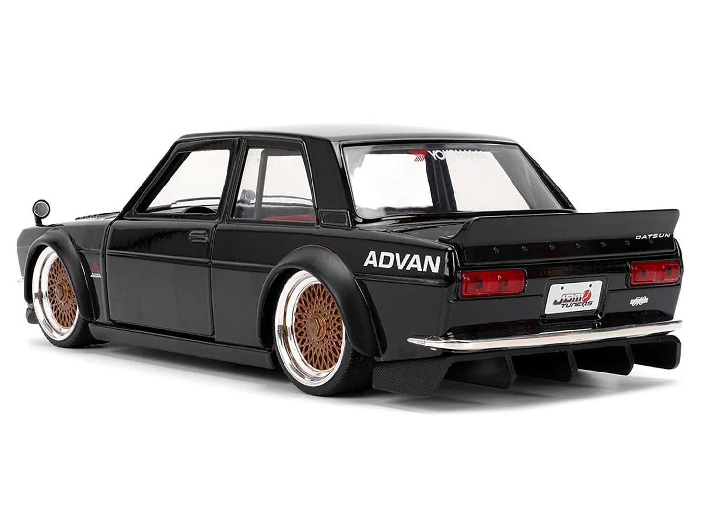 1973 Datsun 510 Black with Gold Wheels "JDM Tuners" Series 1/24 Diecast Model Car by Jada