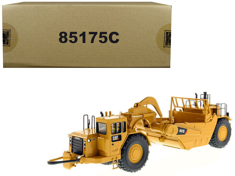 CAT Caterpillar 657 G Wheel Tractor Scraper with Operator "Core Classics Series" 1/50 Diecast Model by Diecast Masters-DiecastModeler.com