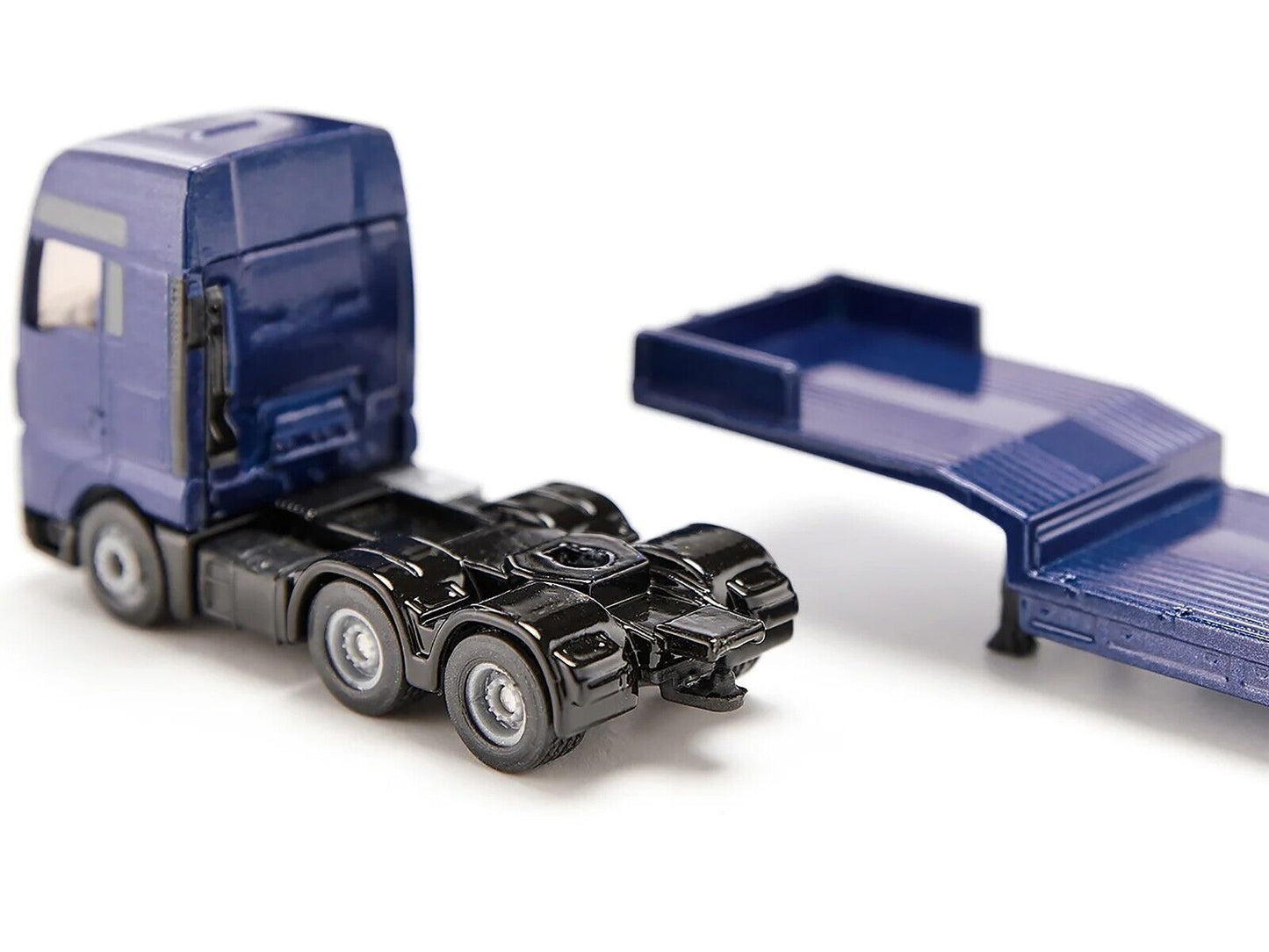 MAN Truck Blue Metallic with Low Loader Trailer and JCB 457 Wheel Loader Yellow 1/87 (HO) Diecast Model by Siku-DiecastModeler.com