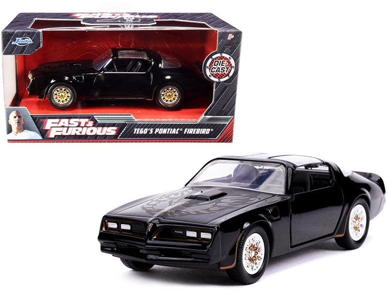 Tego's Pontiac Firebird Black with Gold Stripes and Hood Bird "Fast & Furious" Series 1/32 Diecast Model Car by Jada-DiecastModeler.com