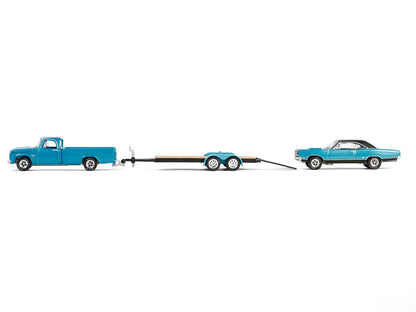 1969 Plymouth GTX Turquoise Metallic and 1967 Dodge D-200 Pickup Truck Turquoise Metallic with Flatbed Trailer "Graveyard Carz" (2012-Current) TV Series "Hollywood Hitch & Tow" Series 13 1/64 Diecast Model Cars by Greenlight
