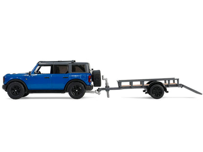 2021 Ford Bronco Black Diamond Velocity Blue Metallic with Black Top with Utility Trailer and Motorcycle "Hitch & Tow" Series 32 1/64 Diecast Model Cars by Greenlight