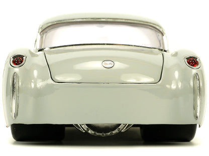 1957 Chevrolet Corvette Beige with Pink Interior with Bugs Bunny Figure "Looney Tunes" "Hollywood Rides" Series 1/24 Diecast Model Car by Jada-DiecastModeler.com