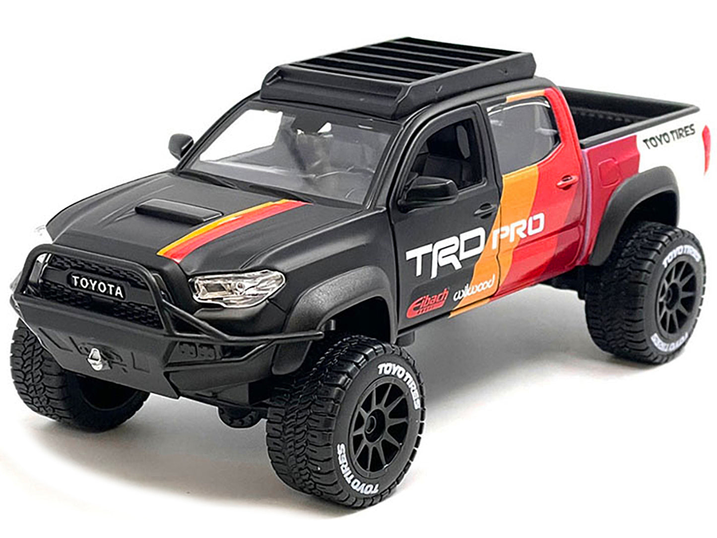 2023 Toyota Tacoma TRD PRO Off Road Pickup Truck Matt Black with Graphics and Roofrack "Maisto Design" Series 1/27 Diecast Model Car by Maisto