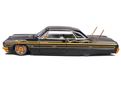 1964 Chevrolet Impala SS Lowrider Black Metallic with Gold Graphics and Gray Interior "Lowriders" "Maisto Design" Series 1/26 Diecast Model Car by Maisto
