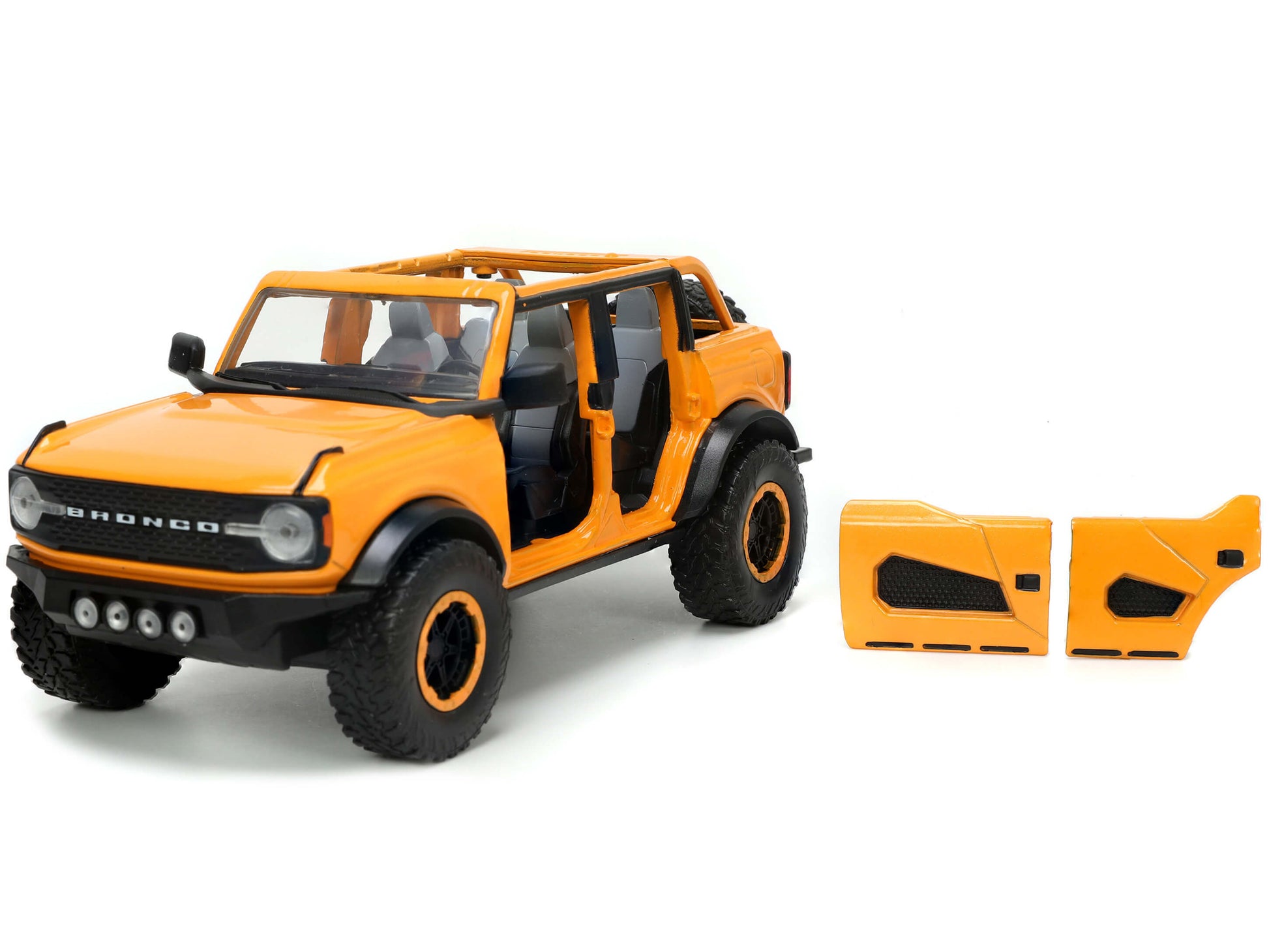 2021 Ford Bronco Orange Metallic with Extra Wheels "Just Trucks" Series 1/24 Diecast Model Car by Jada-DiecastModeler.com
