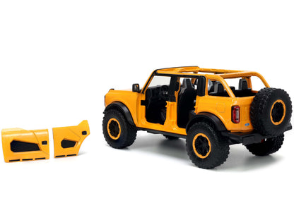 2021 Ford Bronco Orange Metallic with Extra Wheels "Just Trucks" Series 1/24 Diecast Model Car by Jada-DiecastModeler.com