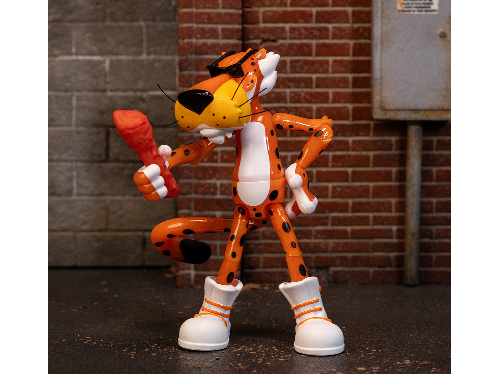 Chester Cheetah 5.5" Glow-in-the-Dark Figure with Accessories and Alternate Head and Hands "Flamin' Hot Cheetos Crunchy" Model by Jada-DiecastModeler.com