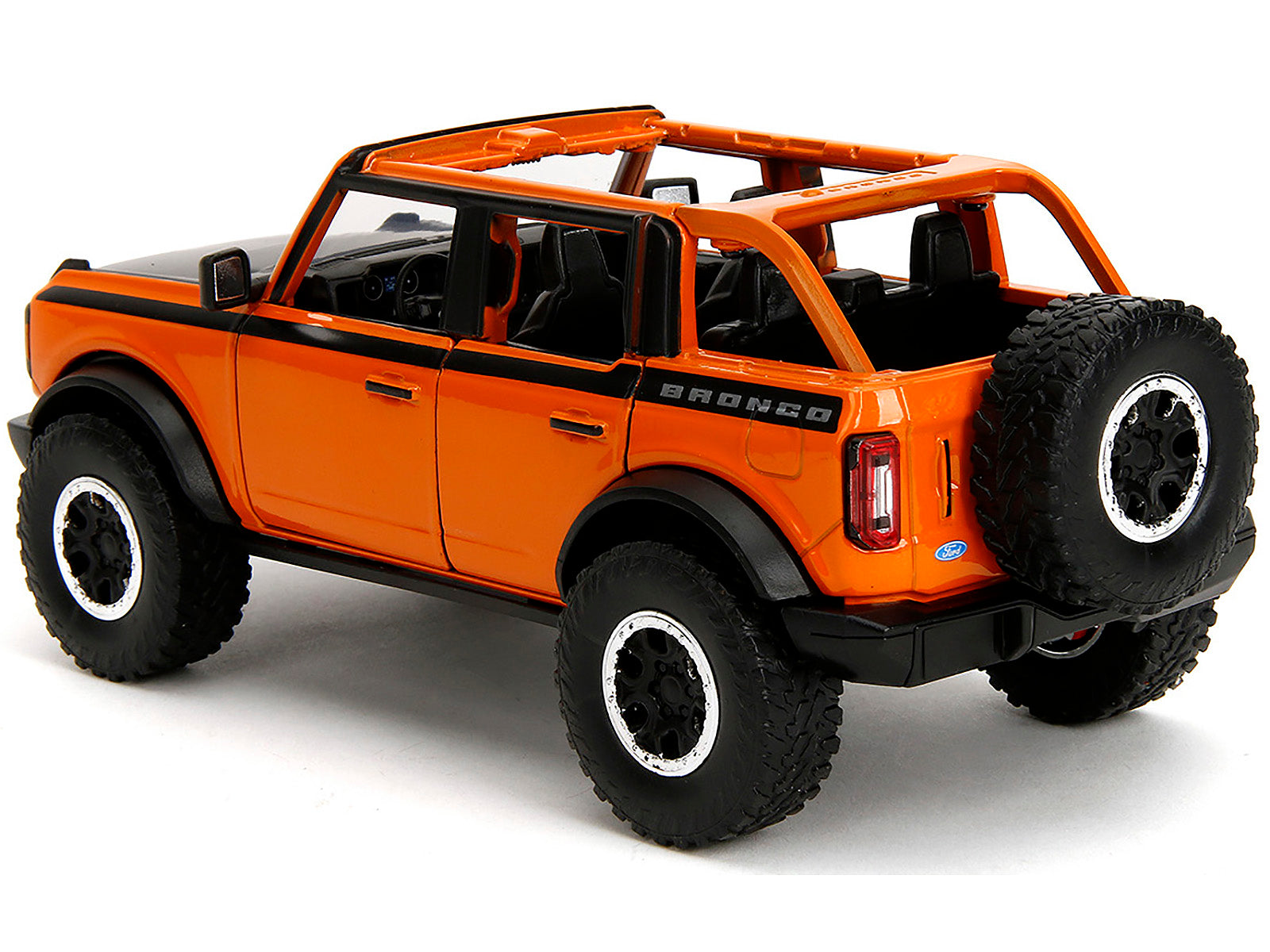 2021 Ford Bronco Open-Top Orange with Black Stripes and Hood with Extra Wheels "Just Trucks" Series 1/24 Diecast Model Car by Jada-DiecastModeler.com