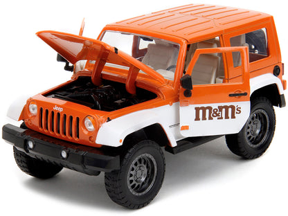 2007 Jeep Wrangler Orange Metallic and White and Orange M&M Diecast Figure "M&M's" "Hollywood Rides" Series 1/24 Diecast Model Car by Jada