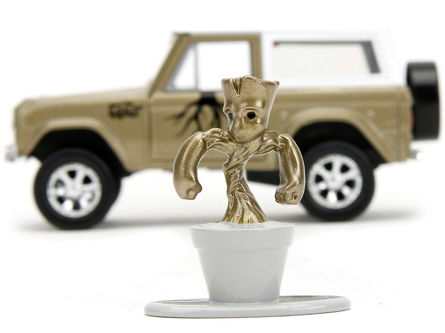 1973 Ford Bronco Gold Metallic with White Top and Groot Diecast Figure "Guardians of the Galaxy" "Marvel" Series 1/32 Diecast Model Car by Jada-DiecastModeler.com
