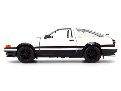 Toyota Trueno (AE86) RHD (Right Hand Drive) White and Black with Graphics and Takumi Diecast Figure "Initial D" (1998-2021) TV Series "Anime Hollywood Rides" Series 1/24 Diecast Model by Jada