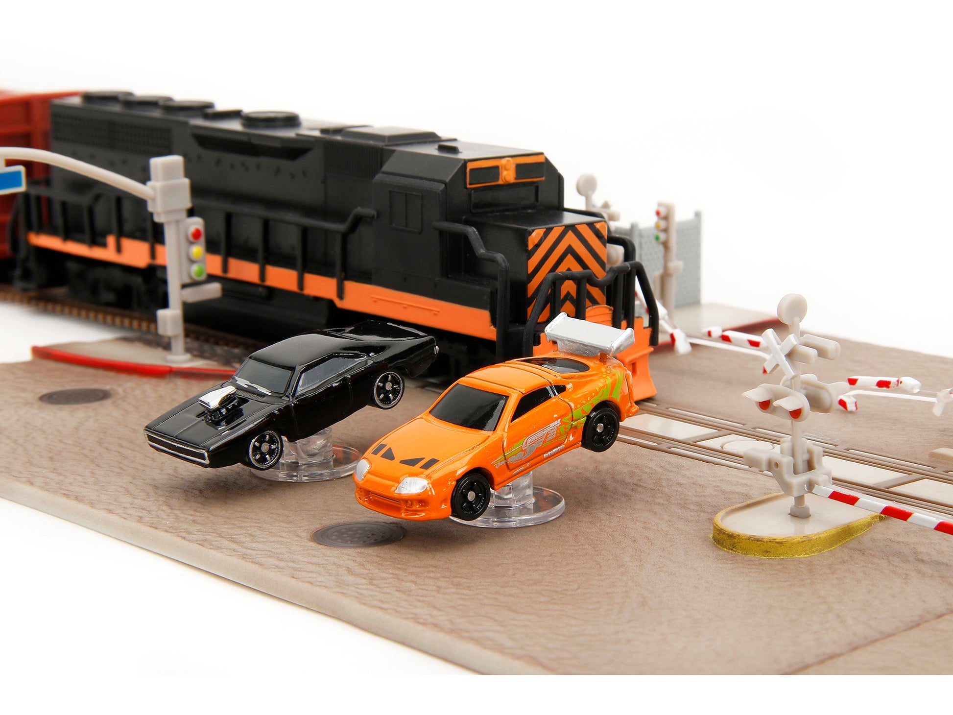 "Fast & Furious" Final Race Diorama with Toyota Supra Orange and Dodge Charger Black "Nano Scene" Series model by Jada-DiecastModeler.com