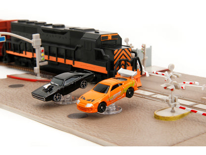 "Fast & Furious" Final Race Diorama with Toyota Supra Orange and Dodge Charger Black "Nano Scene" Series model by Jada-DiecastModeler.com
