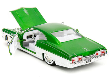 1967 Chevrolet Impala SS Green Metallic and White with White Interior "Bigtime Muscle" Series 1/24 Diecast Model Car by Jada-DiecastModeler.com