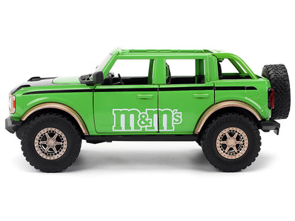 2021 Ford Bronco Green with Black Stripes and Green M&M's Diecast Figure "Hollywood Rides" Series 1/24 Diecast Model Car by Jada-DiecastModeler.com