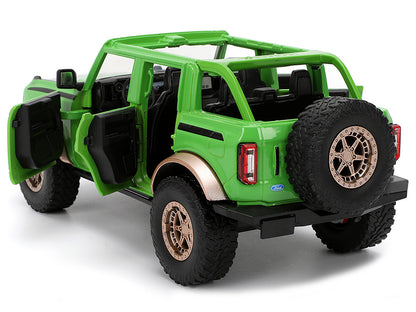 2021 Ford Bronco Green with Black Stripes and Green M&M's Diecast Figure "Hollywood Rides" Series 1/24 Diecast Model Car by Jada-DiecastModeler.com