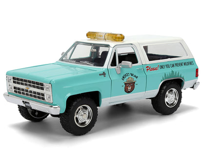 1980 Chevrolet Blazer Light Green with White Top and Graphics and Smokey Bear Diecast Figure "Smokey Bear" "Hollywood Rides" Series 1/24 Diecast Model by Jada