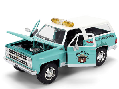 1980 Chevrolet Blazer Light Green with White Top and Graphics and Smokey Bear Diecast Figure "Smokey Bear" "Hollywood Rides" Series 1/24 Diecast Model by Jada