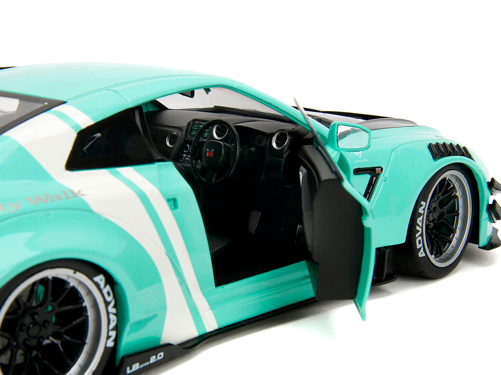Nissan GT-R (R35) Liberty Walk Body Kit 2.0 RHD (Right Hand Drive) Light Blue with Black Hood and White Stripes "Pink Slips" Series 1/18 Diecast Model Car by Jada-DiecastModeler.com
