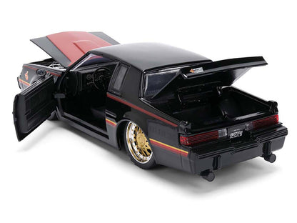 1987 Buick Grand National Black with Matt Red Hood and Stripes "Bigtime Muscle" Series 1/24 Diecast Model Car by Jada