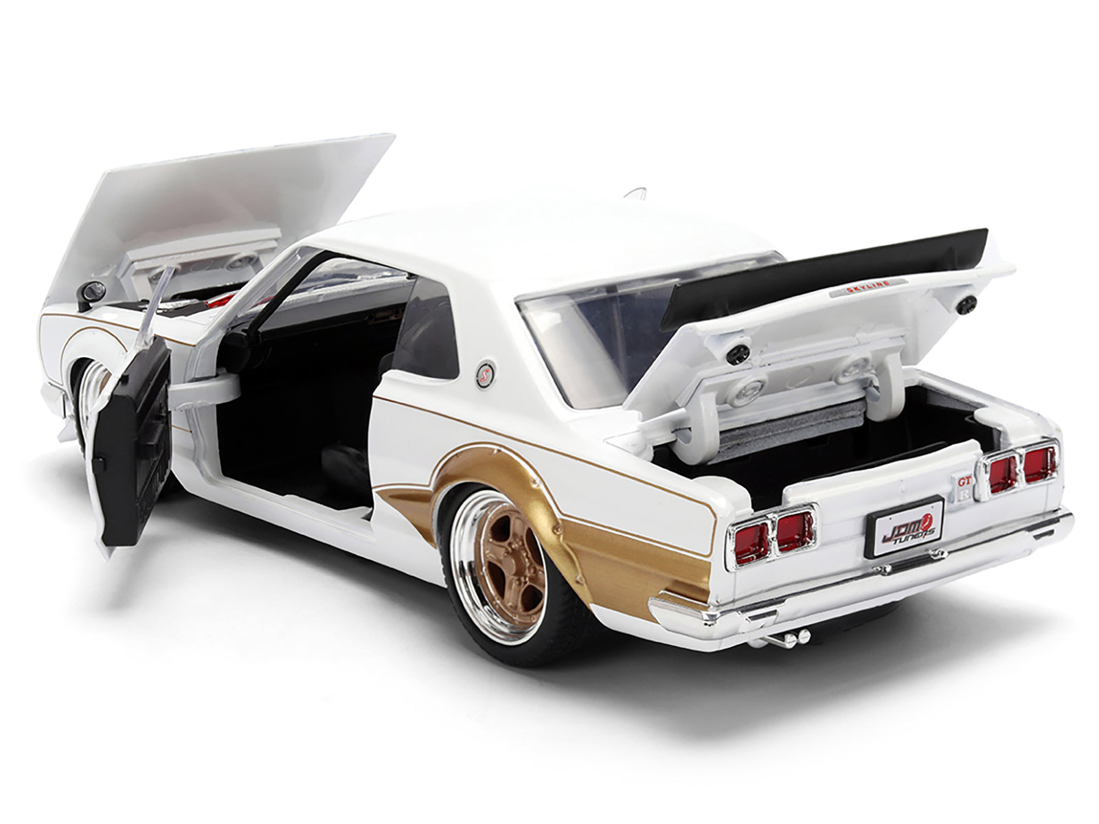 1971 Nissan Skyline 2000GT-R RHD (Right Hand Drive) White with Gold Graphics "JDM Tuners" Series 1/24 Diecast Model Car by Jada-DiecastModeler.com