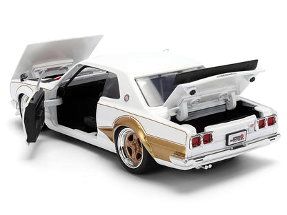 1971 Nissan Skyline 2000GT-R RHD (Right Hand Drive) White with Gold Graphics "JDM Tuners" Series 1/24 Diecast Model Car by Jada