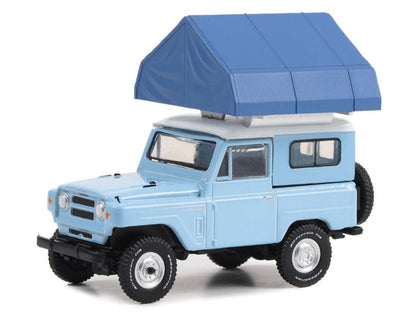 1969 Nissan Patrol (60) Light Blue with White Top and Camp'otel Cartop Sleeper Tent "The Great Outdoors" Series 3 1/64 Diecast Model Car by Greenlight