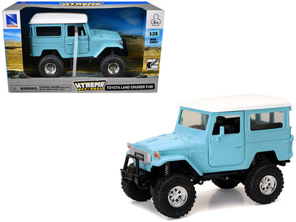 Toyota Land Cruiser FJ40 Light Blue with White Top "Xtreme Off-Road" Series 1/24 Diecast Model by New Ray