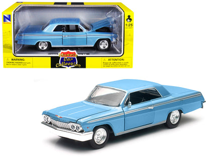 1962 Chevrolet Impala SS Blue 1/25 Diecast Model Car by New Ray-DiecastModeler.com