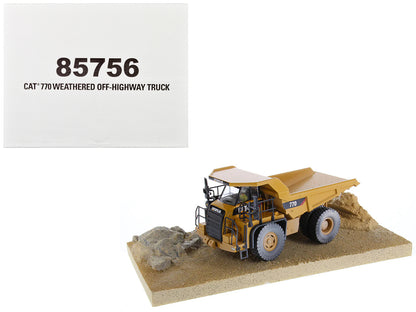 CAT Caterpillar 770 Off-Highway Truck Yellow (Weathered) with Operator "Weathered" Series 1/50 Diecast Model by Diecast Masters-DiecastModeler.com