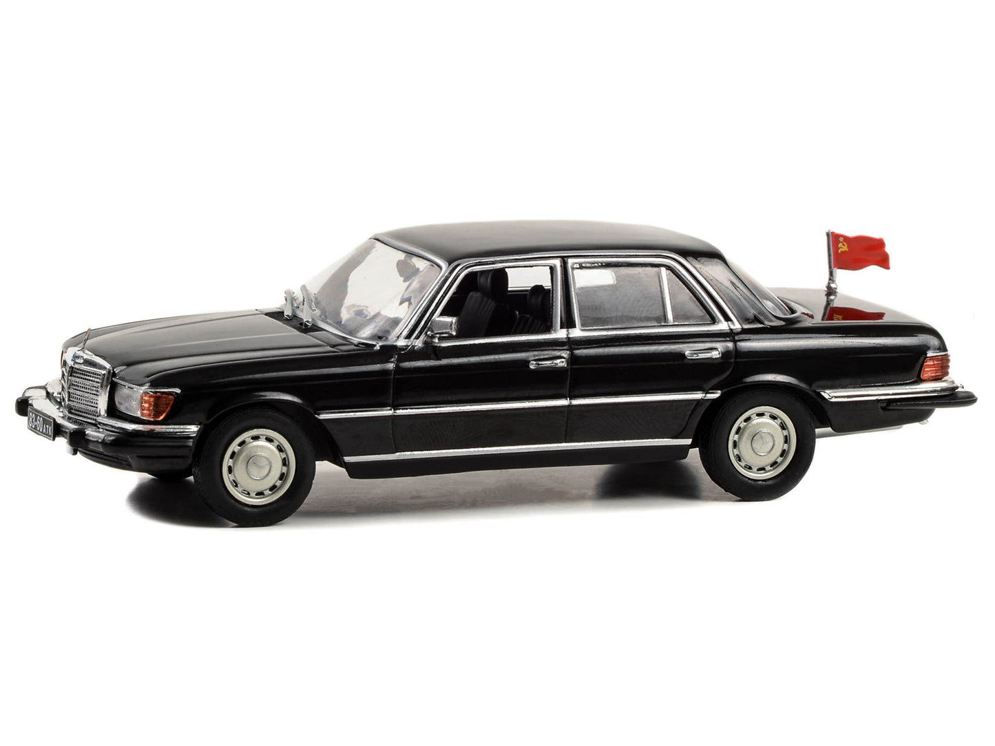 1977 Mercedes-Benz 450 SEL (W116) Black with Soviet Flag "Rocky IV" (1985) Movie 1/43 Diecast Model Car by Greenlight-DiecastModeler.com
