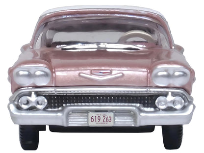 1958 Chevrolet Impala Sport Cay Coral Pink Metallic with White Top 1/87 (HO) Scale Diecast Model Car by Oxford Diecast-DiecastModeler.com