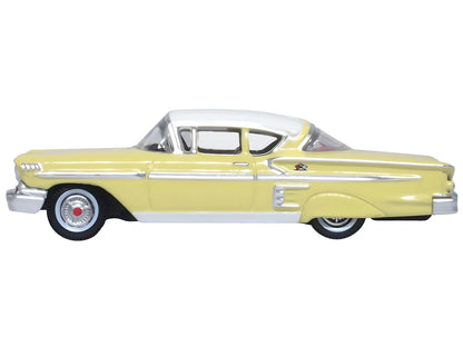 1958 Chevrolet Impala Sport Colonial Cream with Snowcrest White Top 1/87 (HO) Scale Diecast Model Car by Oxford Diecast-DiecastModeler.com