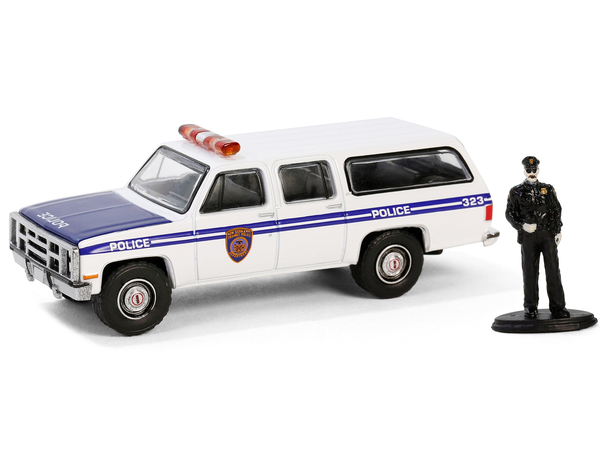 1985 GMC Suburban 2500 "New York City Transit Police Department" White with Blue Stripes and Police Officer Figure "The Hobby Shop" Series 16 1/64 Diecast Model Car by Greenlight-DiecastModeler.com