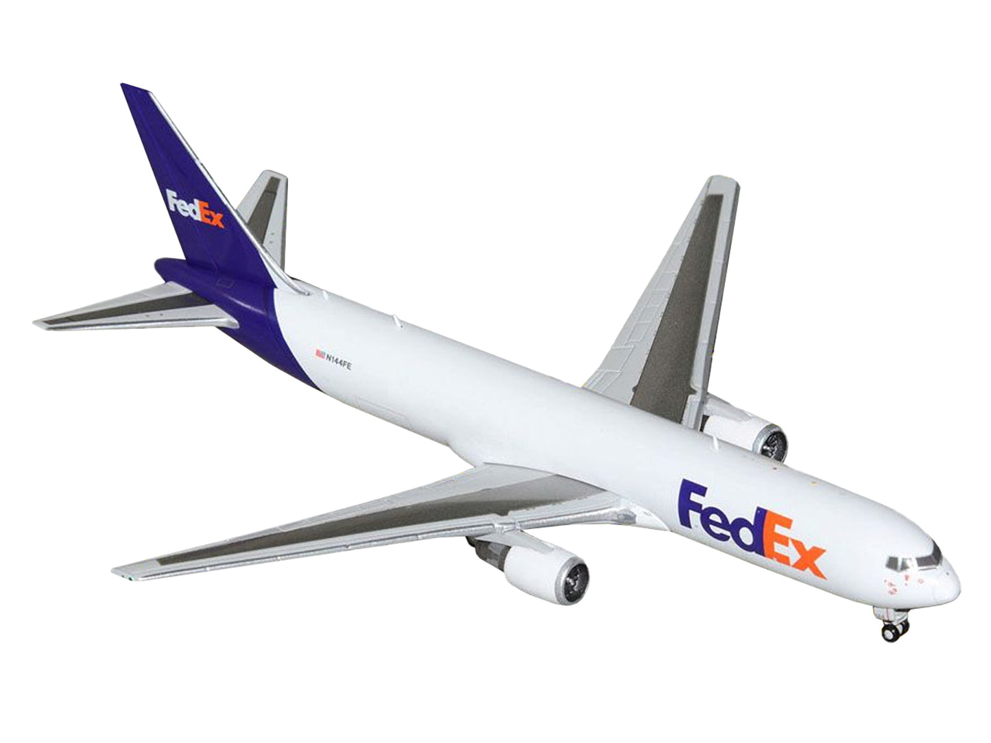 Boeing 767-300F Commercial Aircraft "FedEx (Federal Express)" (N144FE) White with Purple Tail 1/400 Diecast Model Airplane by GeminiJets