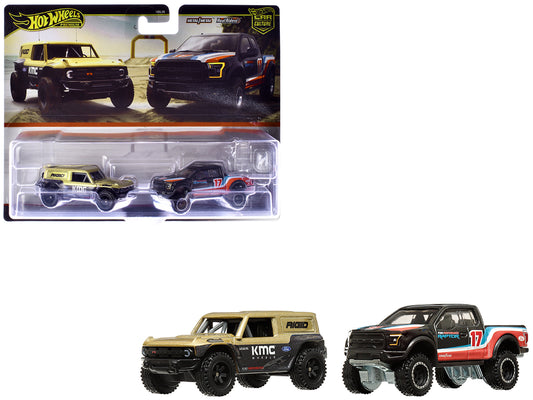 Ford Bronco R Gold Metallic and Black and 2017 Ford F-150 Raptor Pickup Truck #17 Black with Stripes "Car Culture" Set of 2 Cars Diecast Model Cars by Hot Wheels-DiecastModeler.com