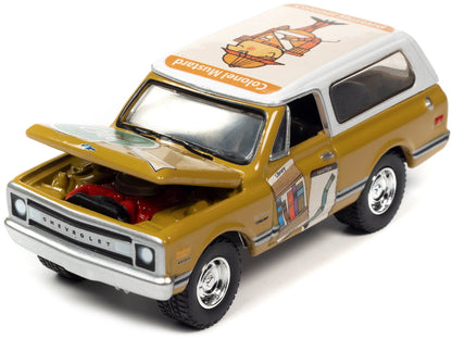 1970 Chevrolet Blazer Mustard Yellow with White Top (Colonel Mustard) w/Poker Chip Collector's Token "Vintage Clue" "Pop Culture" 2022 Release 2 1/64 Diecast Model Car by Johnny Lightning-DiecastModeler.com