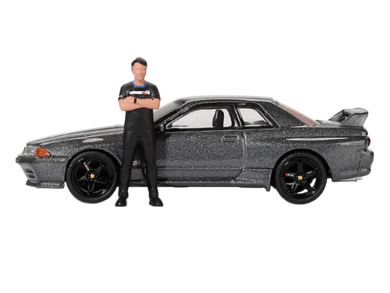 Nissan Skyline GT-R (R32) RHD (Right Hand Drive) Gunmetal Gray Metallic with Tsugio Matsuda Figure Limited Edition 1/64 Diecast Model Car by Mini GT-DiecastModeler.com