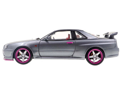 1999 Nissan Skyline GT-R (R34) RHD (Right Hand Drive) Silver Metallic with Purple Wheels 1/18 Diecast Model Car by Solido-DiecastModeler.com