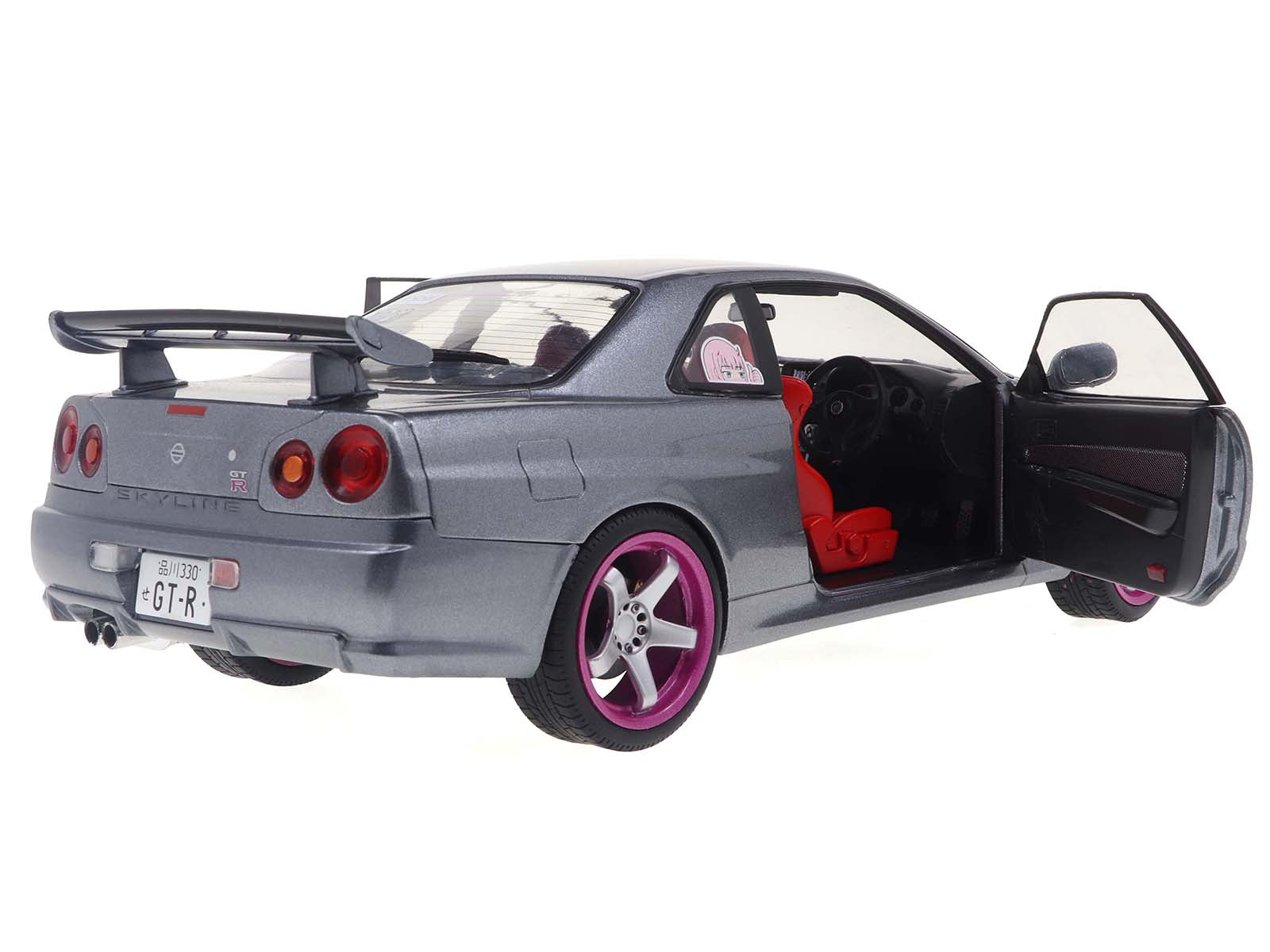 1999 Nissan Skyline GT-R (R34) RHD (Right Hand Drive) Silver Metallic with Purple Wheels 1/18 Diecast Model Car by Solido-DiecastModeler.com