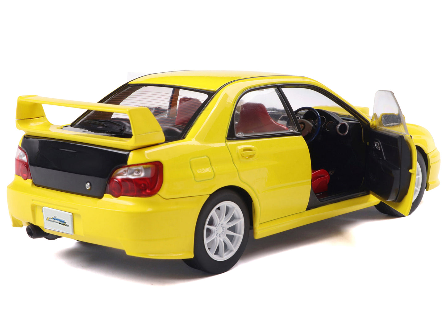 2003 Subaru Impreza WRX STI RHD (Right Hand Drive) Yellow with Carbon Hood 1/18 Diecast Model Car by Solido