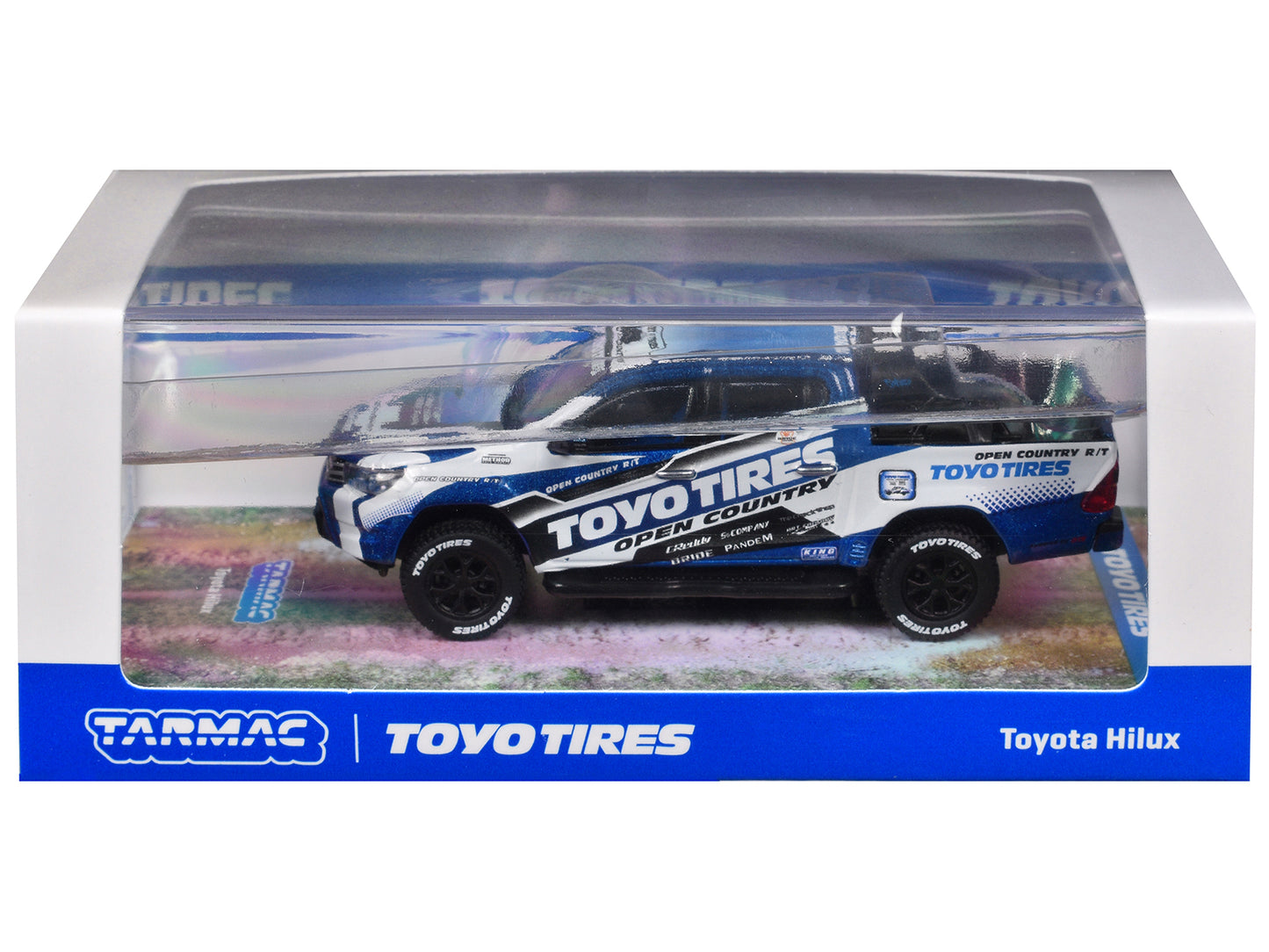 Toyota Hilux Pickup Truck RHD (Right Hand Drive) "Toyo Tires" White and Blue with Graphics "Hobby64" Series 1/64 Diecast Model Car by Tarmac Works