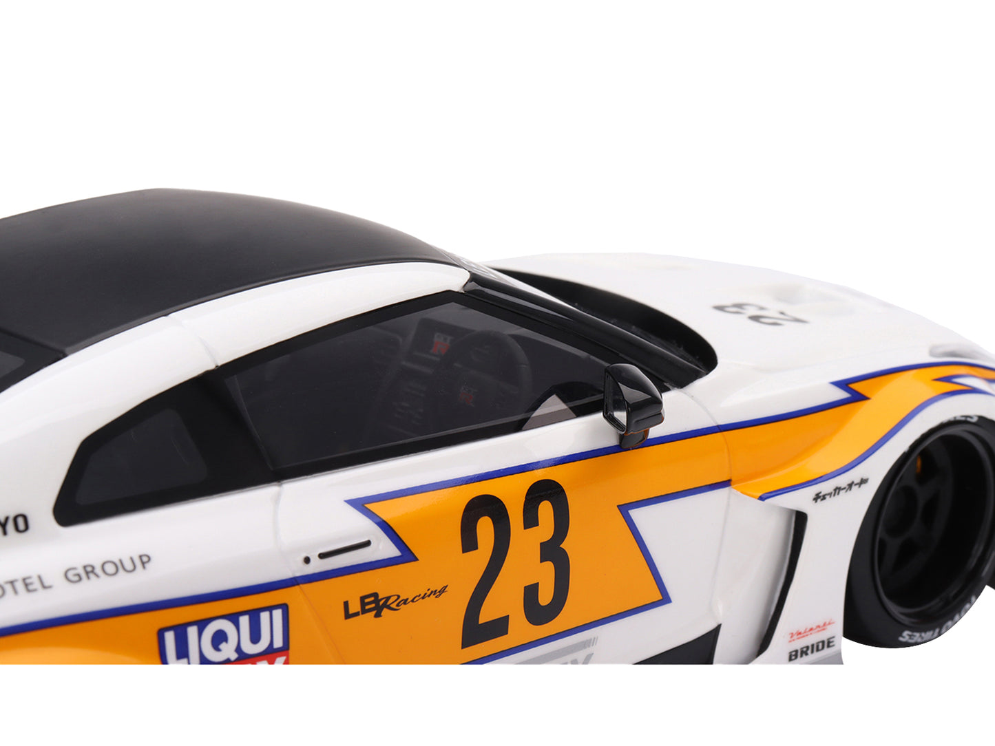 Nissan LB-Silhouette WORKS GT 35GT-RR Ver.1 RHD (Right Hand Drive) #23 White with Yellow Stripes "LB Racing" 1/18 Model Car by Top Speed-DiecastModeler.com