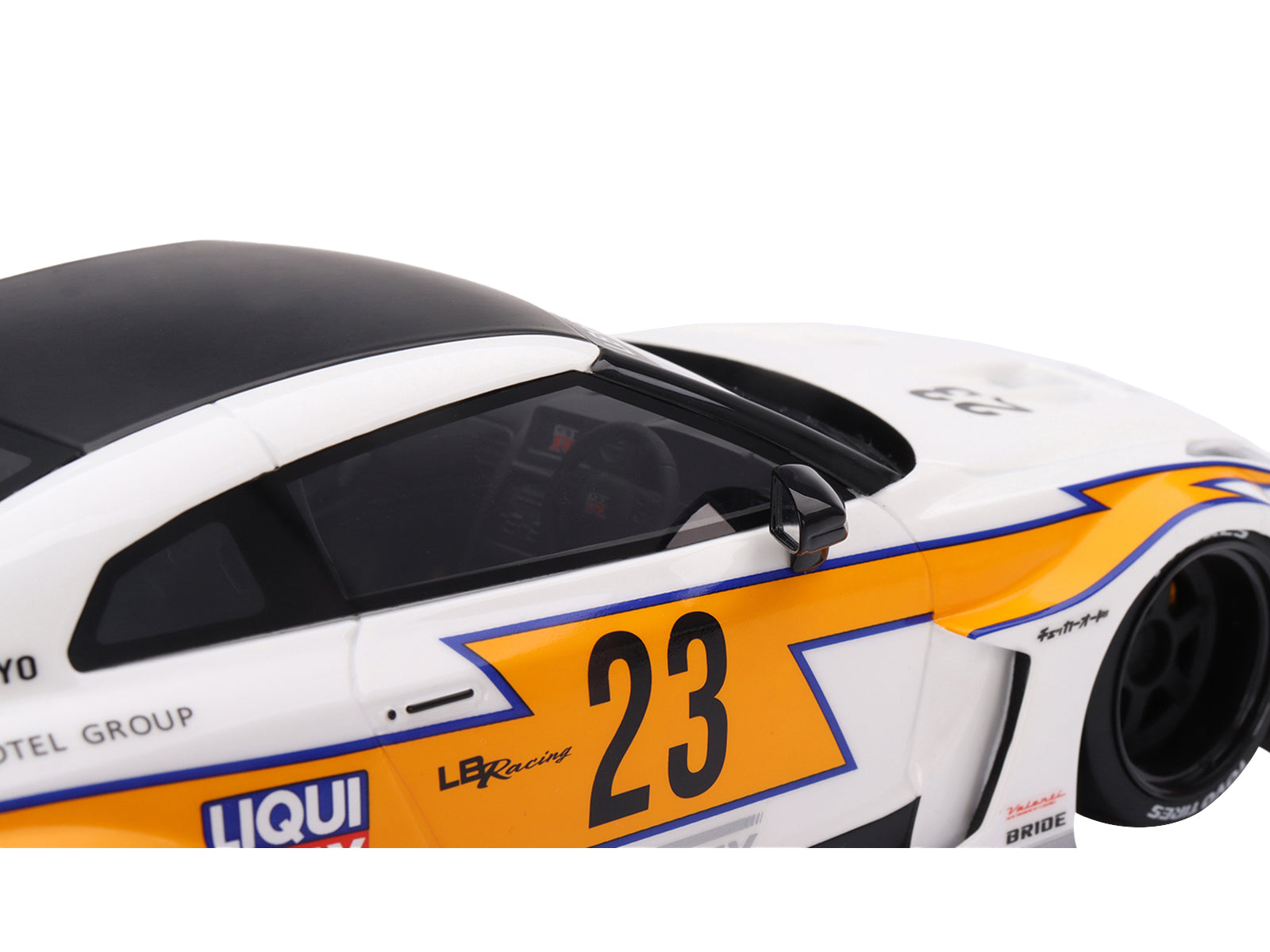 Nissan LB-Silhouette WORKS GT 35GT-RR Ver.1 RHD (Right Hand Drive) #23 White with Yellow Stripes "LB Racing" 1/18 Model Car by Top Speed-DiecastModeler.com
