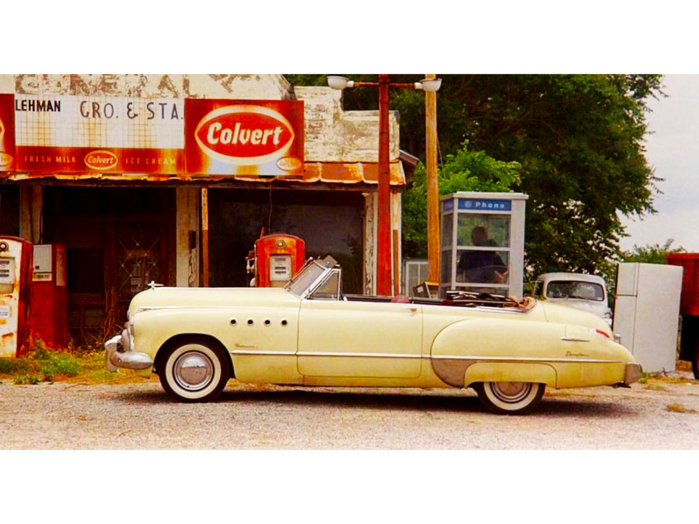 1949 Buick Roadmaster Convertible (Charlie Babbitt's) Yellow with Red Interior "Rain Man" (1988) Movie 1/18 Diecast Model Car by Greenlight-DiecastModeler.com