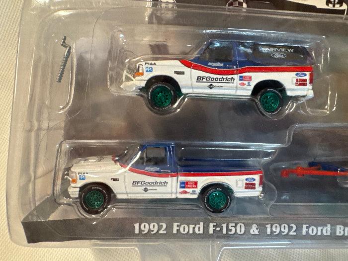 Hitch & Tow - Ford F-150 Pickup Truck and Ford Bronco with Flatbed Trailer BFGR (GREEN)-DiecastModeler.com