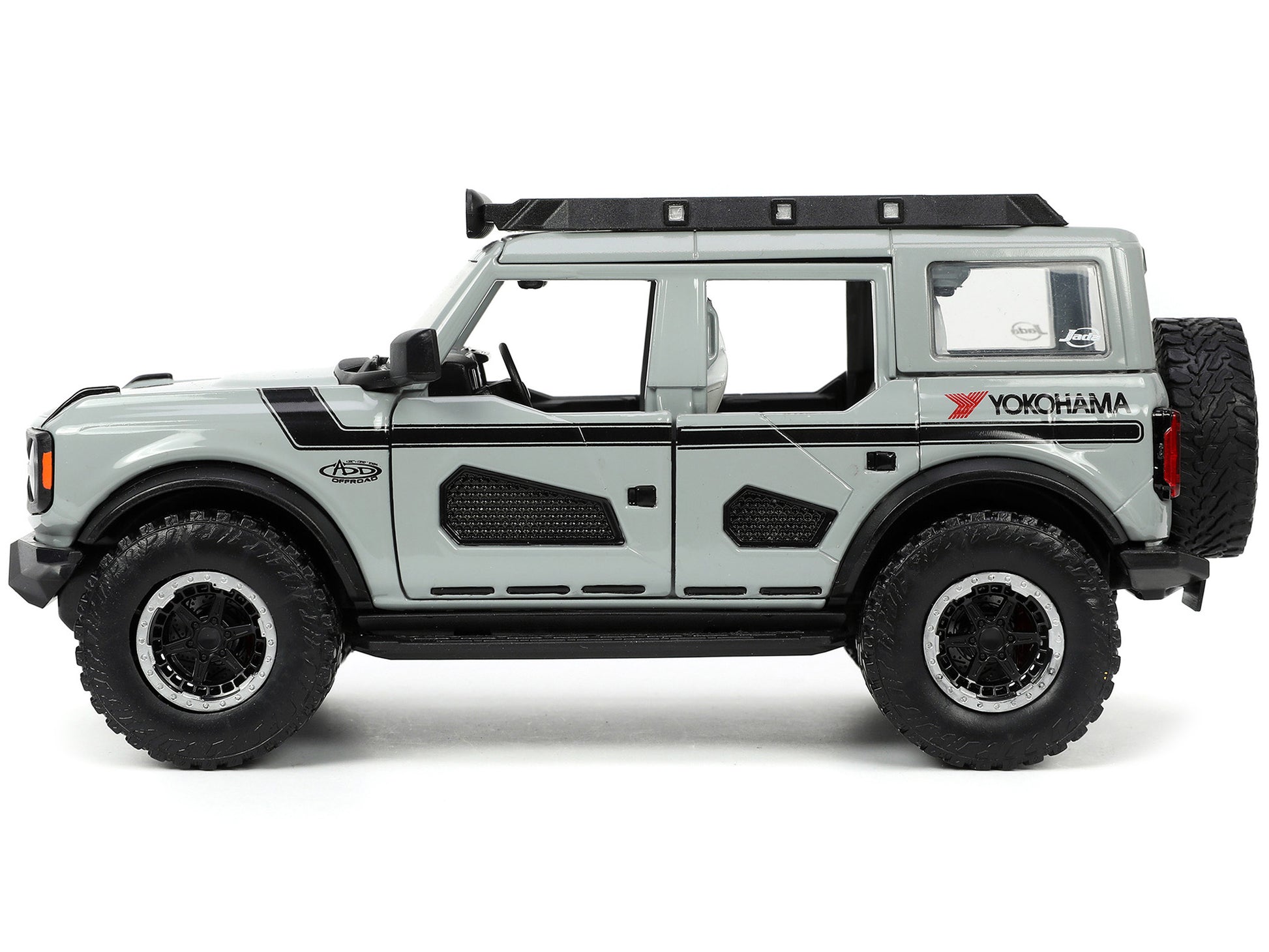 2021 Ford Bronco Gray with Black Stripes with Roof Rack "Own the Night" "Just Trucks" Series 1/24 Diecast Model Car by Jada-DiecastModeler.com