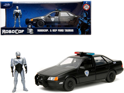 Ford Taurus OCP Matt Black "Detroit Police" and Robocop Diecast Figure 35th Anniversary "Robocop" (1987) Movie "Hollywood Rides" Series 1/24 Diecast Model Car by Jada-DiecastModeler.com